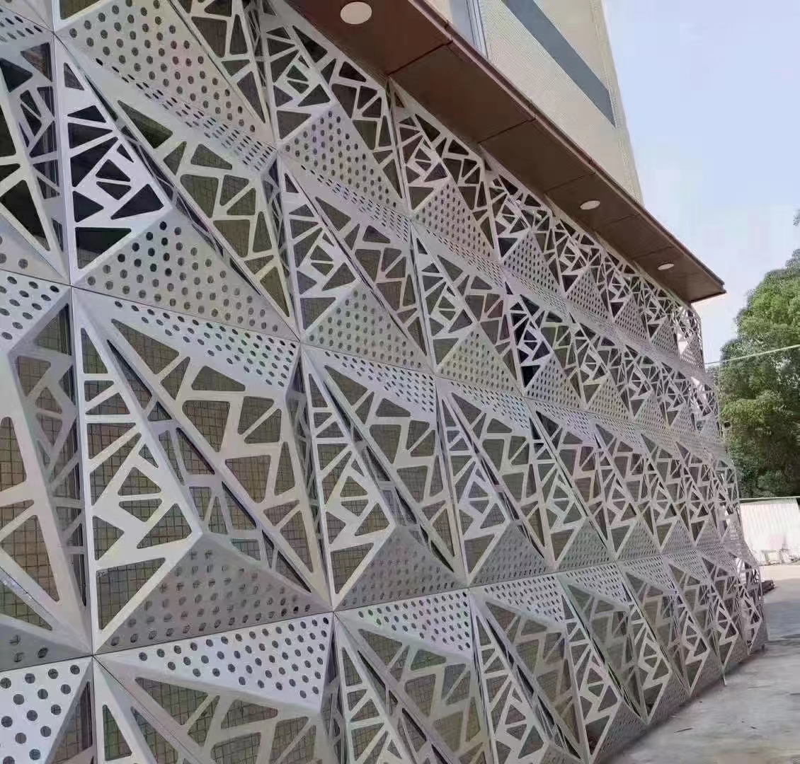 Geometric pierced facade panels